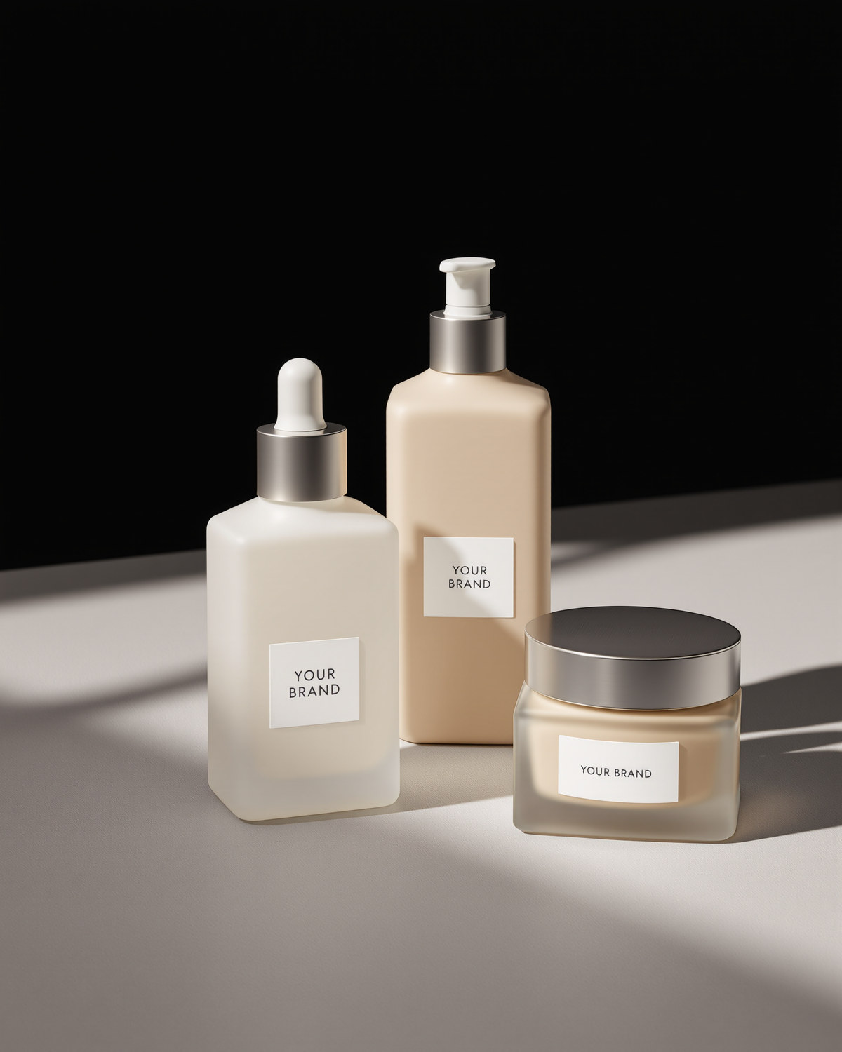 Frosted glass dropper bottle, pump bottle and cream jar labelled Your Brand — private label cosmetics manufactured by Dora Kozmetik